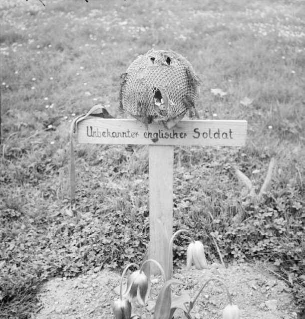 The grave of a British airborne soldier killed during the battle of Arnhem in September 1944, photographed by liberating forces on 15 April 1945
