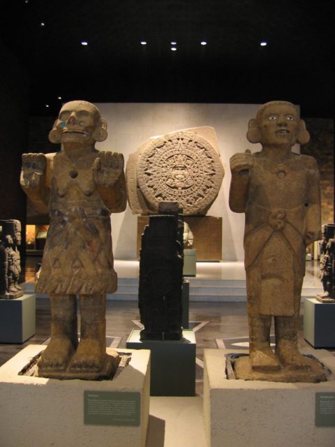 Aztec gods- Coatlique (left) and Xiuhtecuhtli-Huitzilopochtli (right). By Xuan Che / CC BY 2.0