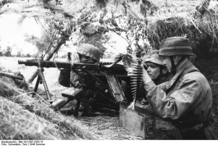 German paratroopers with MG 42, Normandy. By Bundesarchiv – CC BY-SA 3.0 de