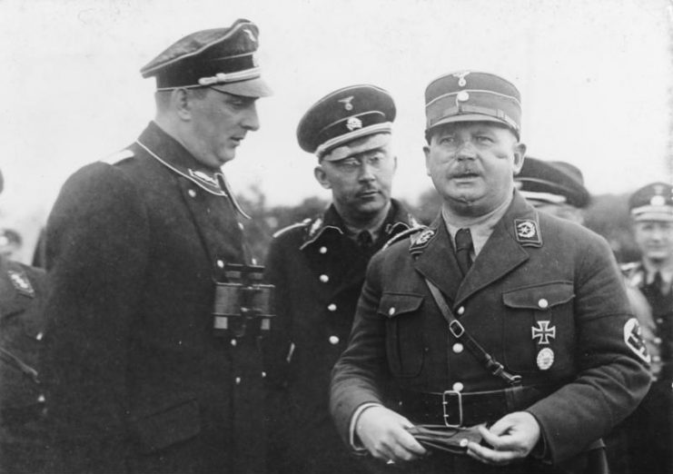 Kurt Daluege, chief of the Order Police; Heinrich Himmler, head of the SS; and Ernst Röhm, head of the Stormtroopers. Photo: Bundesarchiv, Bild 102-14886 / CC-BY-SA 3.0.