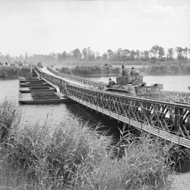 Cromwell Tanks Crossing a bailey bridge over the Caen Canal and Orne River.
