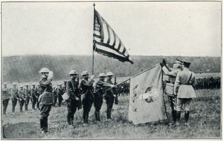 Decoration of U.S. 104th Regimental Flag in France, WWI.