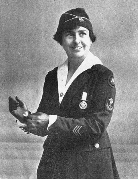 Chief Operator Grace Banker receiving a Distinguished Medal of Service for her role in the US Army Signal Corps in WWI.