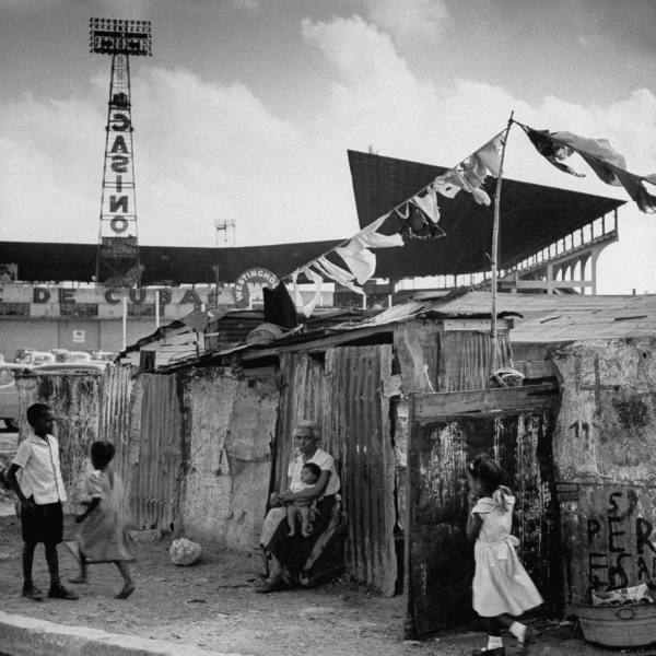Havana Slums in 1954 near the baseball stadium and advertising for a casino.
