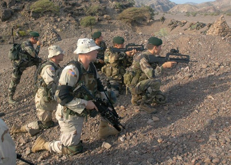U.S. Army Special Forces and French Commandos Marine conduct a reconnaissance patrol during a joint-combined exercise in Djibouti, 2004