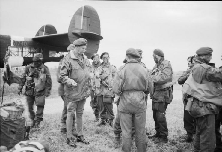 The Airborne Assault: Major General R N Gale OBE MC, the commander of 6th Airborne Division, talking to troops of 5th Parachute Brigade.