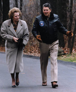 President Reagan walking with Prime Minister Margaret Thatcher at Camp David.