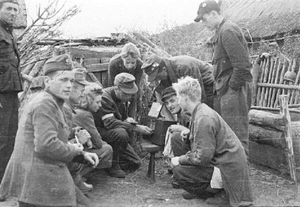 Polish partisans listening to a radio