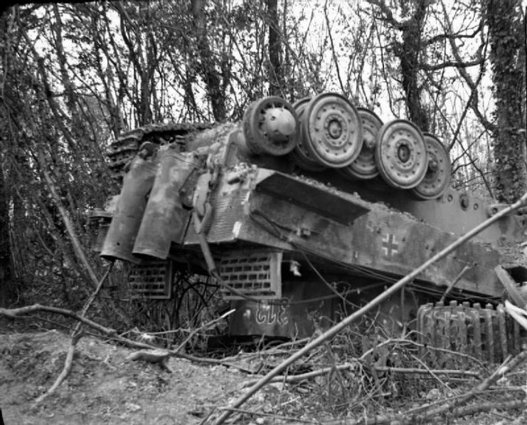 Tiger 1 overturned by the Allied bombing before Goodwood began.