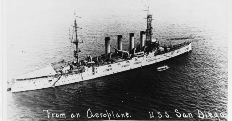 USS San Diego. Photographed from an airplane in San Diego harbor, California, 28 March 1916. Collection of Thomas P. Naughton, 1973. U.S. Naval History and Heritage Command Photograph.