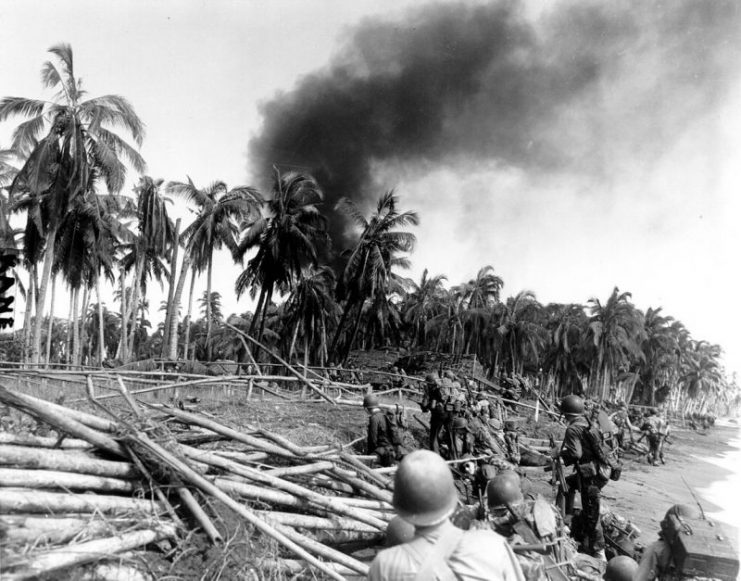 American troops of Troop E, 7th Cavalry Regiment, advance towards San Jose on Leyte Island, Philippine Islands.