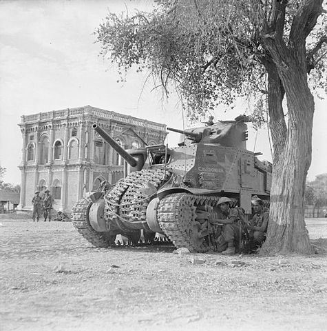 A British M3 Lee in Mandalay, Burma, (Myanmar), during the 1944-1945 part of the Burma Campaign, March 1945. Spare tracks are welded onto the front for extra protection