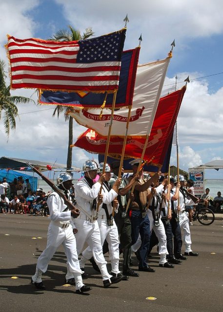 A Joint Service Color Guard parades the colors during Liberation Day parades on the U.S. territory of Guam.