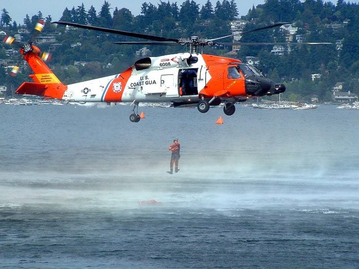 United States Coast Guard rescue diver jumps from a HH-60 Jayhawk during a demonstration at the 2004 Seafair in Seattle, Washington.Photo: Brandon Weeks CC BY 3.0
