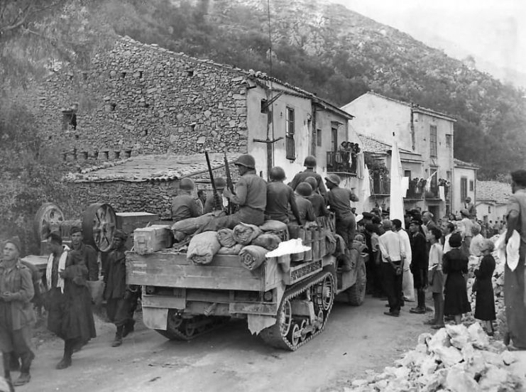 Allied Troops on M3 Halftrack Greeted by Civilians in Liberated Pioppo Sicily 1943
