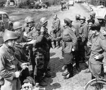 American and Soviet troops meet east of the Elbe River, April 1945.