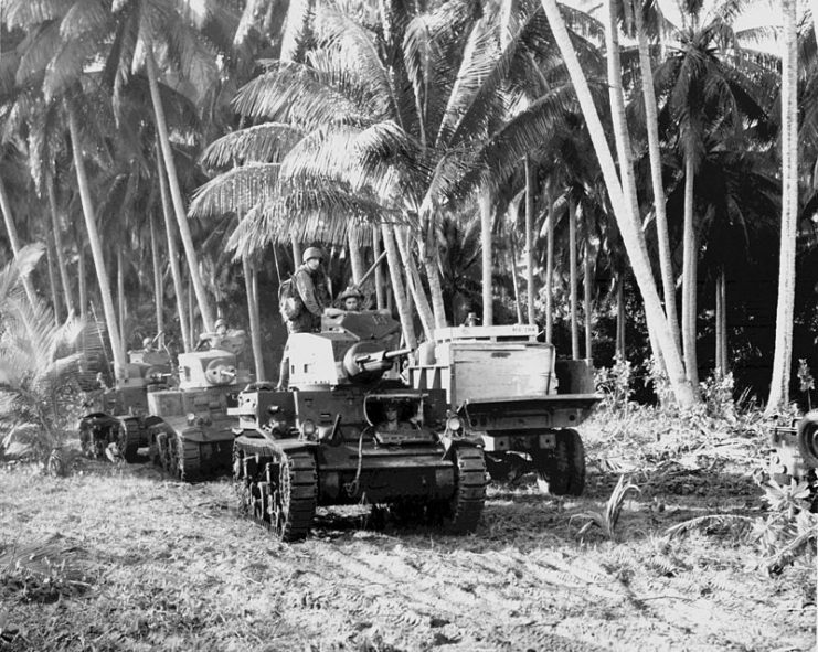 An M2A4 on Guadalcanal, followed by an M3 Stuart and another M2A4