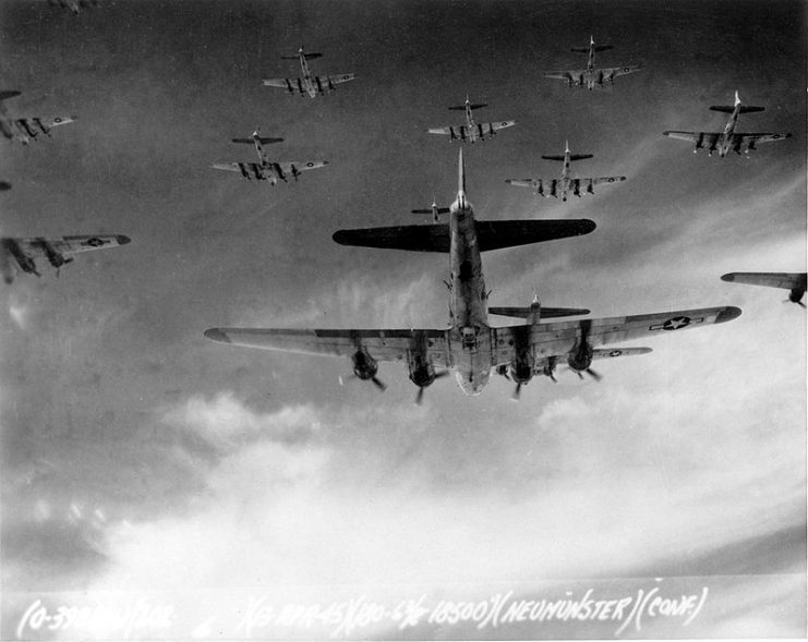 B-17 Flying Fortresses from the 398th Bombardment Group flying a bombing run to Neumünster, Germany, on 13 April 1945.