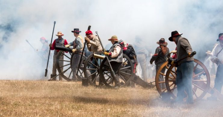 Confederate soldiers fire canon during Civil War Reenactment at Duncan Mills.