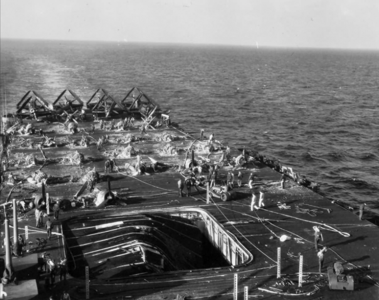Deck of the aircraft carrier USS Bunker Hill covered with wreckage of destroyed planes