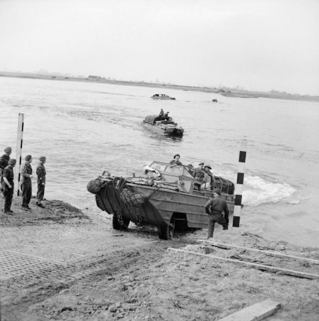 DUKW amphibious vehicles ferrying supplies across the Rhine, 25 March 1945.