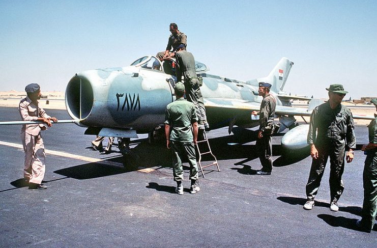 Egyptian Air Force personnel inspect an Egyptian F-6