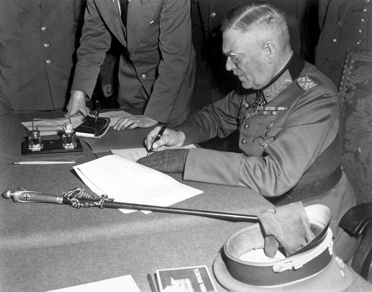 Field Marshall Wilhelm Keitel signing the unconditional surrender of the German Wehrmacht at the Soviet headquarters in Karlshorst, Berlin. 8 May 1945