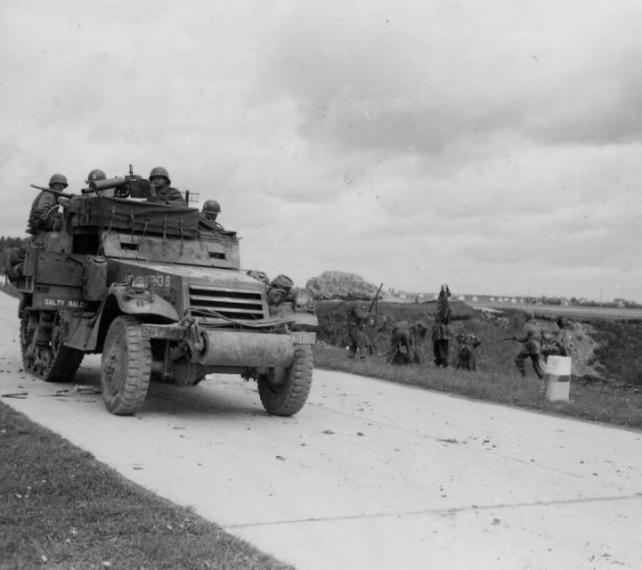 M3A1 halftrack of 3rd Infantry Division and 20th Armored Division Takes POWs Munich Germany 1945