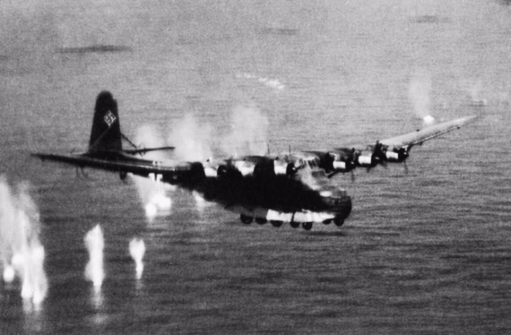 Photo of Luftwaffe Me-323 being shot down by a B-26 Marauder of the Northwest African Coastal Air Force near Cap Corse, Corsica.