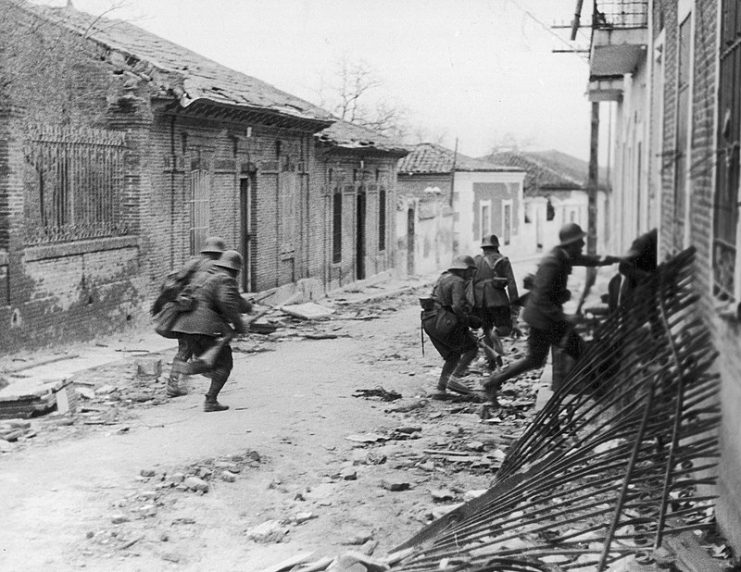 Nationalist soldiers raiding a suburb of Madrid during the Spanish Civil War. c.a 1937