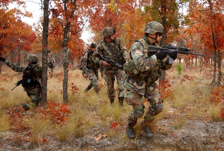 Paratroopers of 3rd Battalion, 325th Infantry Regiment, move toward an objective during a live-fire exercise at Fort Bragg, North Carolina.