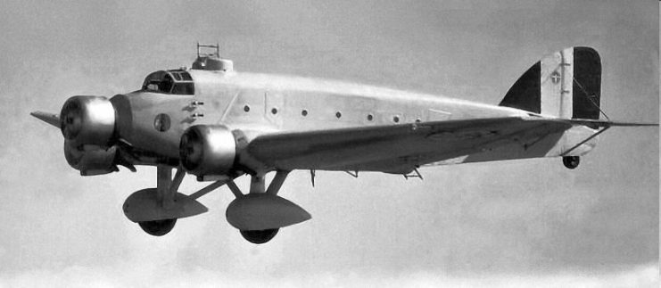 Savoia-Marchetti SM.81 – Nationalist aircraft bomb Madrid in late November 1936. Fiat CR 32s – flown by Italian pilots – provide fighter cover.