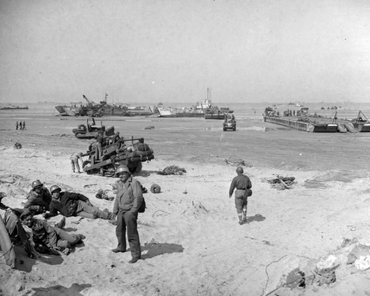 A scene on one of the invasion beaches during force buildup operations in June 1944