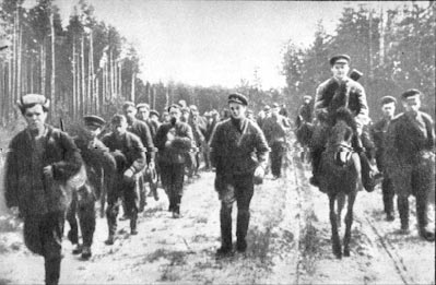 Soviet partisans on the road in Belarus, 1944 counter-offensive.