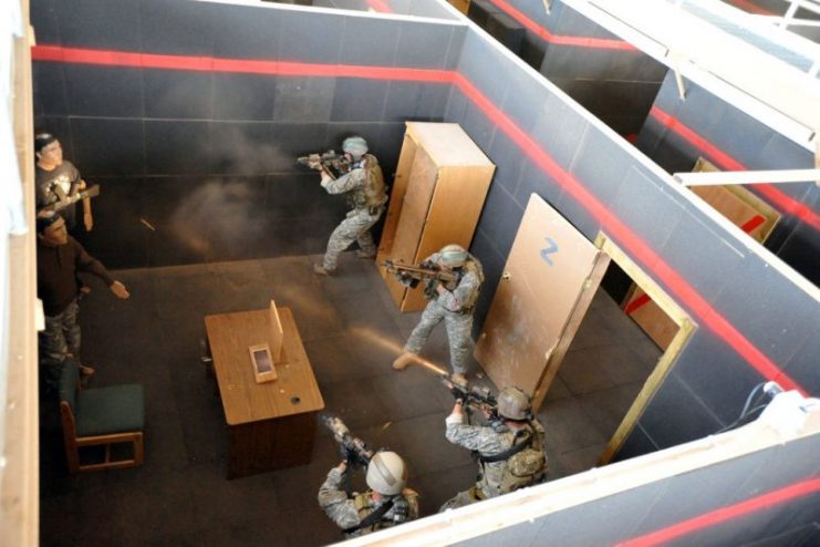 Special Forces soldiers from 3rd Battalion, 10th Special Forces Group (Airborne), conduct shoot-house training at Fort Carson in September 2009.