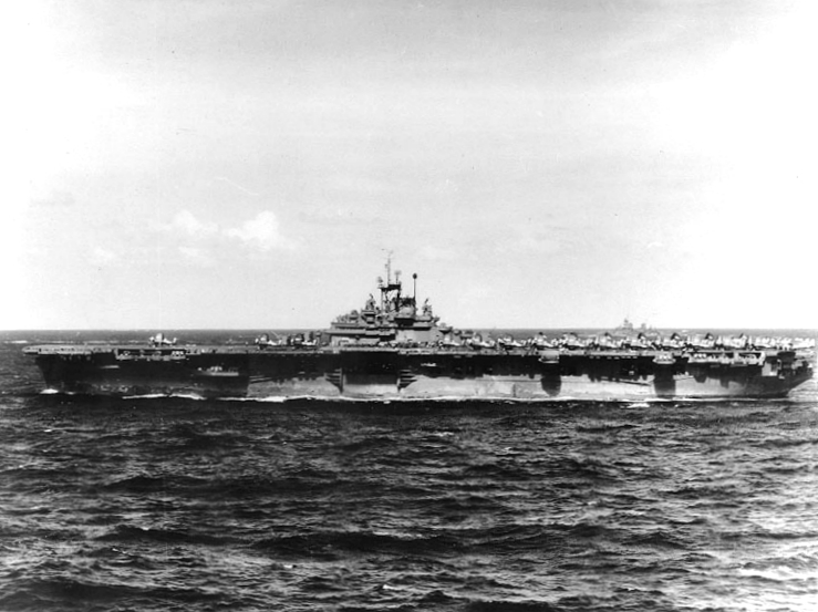 USS Bunker Hill (CV-17) at sea during strikes against targets on Kyushu, Japan, 18 Mar 1945