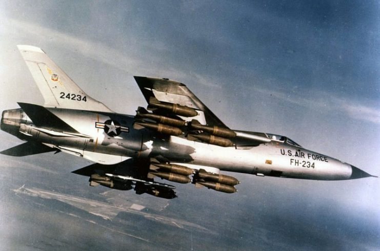 Republic F-105D Thunderchief in flight with a full bomb load of M117 750 lb bombs. Normally drop tanks were carried on the inboard wing pylons. This aircraft was shot down on 24 Dec 1968 over Laos while being assigned to the Wing Headquarters, 355th Tactical Fighter Wing, Takhli RTAFB.