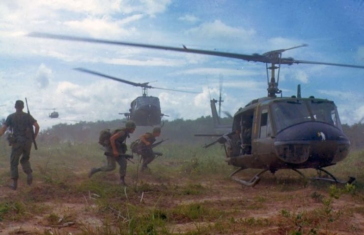 U.S. Army Bell UH-1D helicopters airlift members of the 2nd Battalion, 14th Infantry Regiment from the Filhol Rubber Plantation area to a new staging area, during Operation “Wahiawa”, a search and destroy mission conducted by the 25th Infantry Division, northeast of Cu Chi, South Vietnam, 1966.