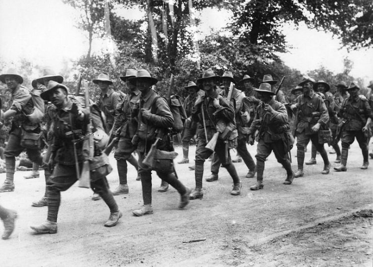 Australian troops marching along a road, France, during World War I.