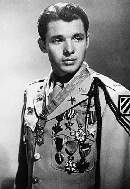Audie Murphy photographed in 1948 wearing the U.S. Army khaki “Class A” (tropical service) uniform with full-size medals. A war hero and “an object of passion” of countless women.