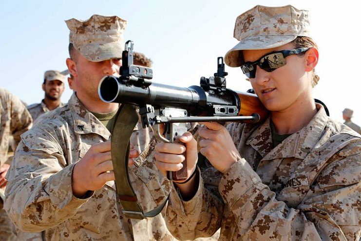 U.S. Marine Corps 2nd Lt. Christine M. Dullnig, right gets ready to fire an RPG-7.By U.S. Naval Forces Central Command/U.S. Fifth Fleet CC BY 2.0