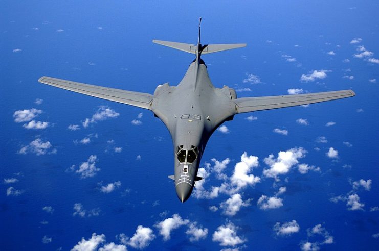 Soaring over the Pacific ocean- A B-1B Lancer drops back after air refueling training