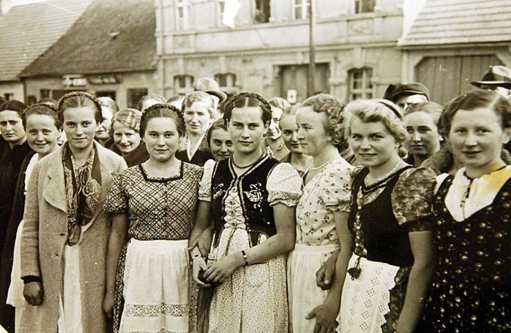 German Invasion of Poland, September 1939. Translated German reads, “Female village youth from a village in the former Poland.”