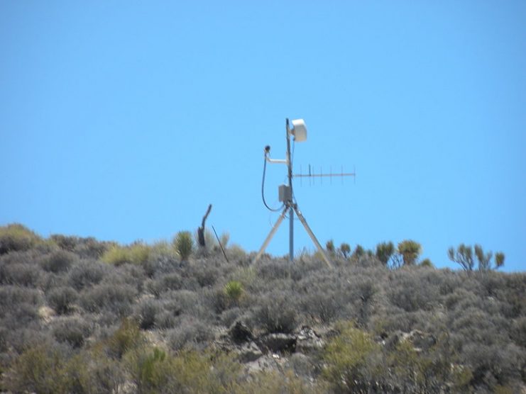 A guard tower equipped with a camera at area 51. By Jimderkaisser CC BY-SA 3.0
