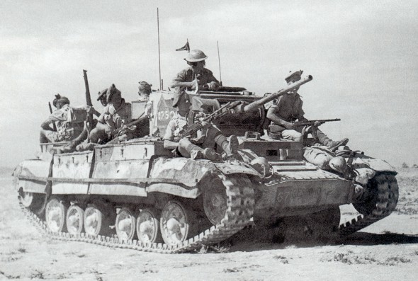 A Valentine tank in North Africa, carrying British infantry