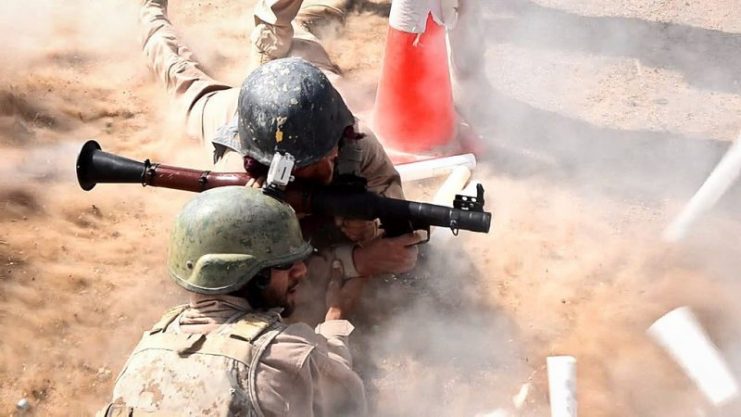 An Afghan National Army soldier fires a rocket-propelled grenade (RPG) during a live-fire operational training shoot at Joint Sustainment Academy Southwest, Camp Leatherneck, Helmand province.