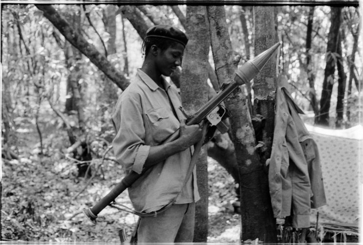 Guerilla of the PAIGC resistance movement against Portugal showing his RPG, Guinea-Bissau, 1974. By Roel Coutinho CC BY-SA 4.0