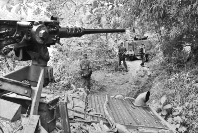 Australian soldiers and M113 APCs during the Operation