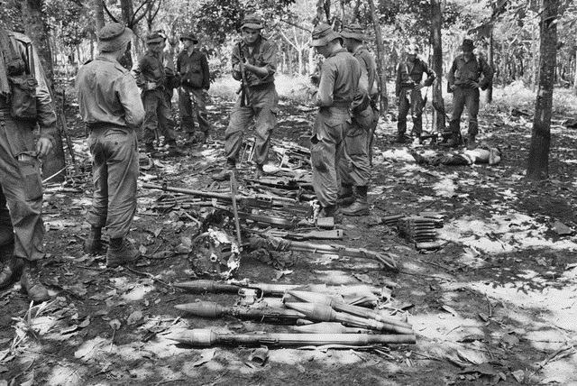 Australian troops with weapons captured at Long Tan