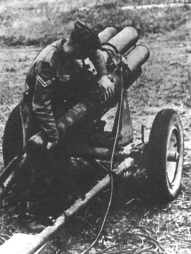 An Allied soldier inspecting a captured Nebelwerfer